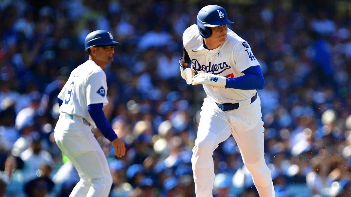 Los Angeles Dodgers designated hitter Shohei Ohtani (17) scores during the first inning against the San Francisco Giants at Dodger Stadium.