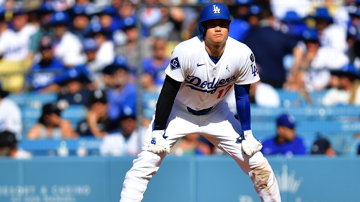 Los Angeles Dodgers designated hitter Shohei Ohtani (17) leads off first during the second inning against the San Francisco Giants at Dodger Stadium.
