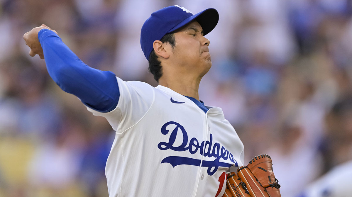 Los Angeles Dodgers designated hitter Shohei Ohtani (17) throws against the San Diego Padres during the first inning at Dodger Stadium.