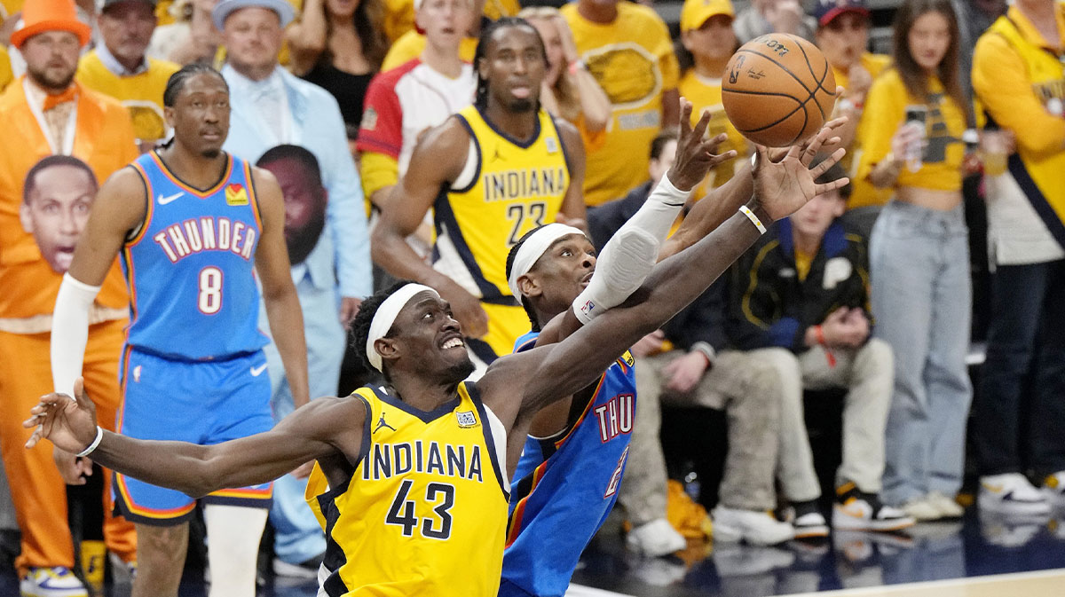 Indiana Pacers forward Pascal Siakam (43) reaches for the ball against Oklahoma City Thunder guard Shai Gilgeous-Alexander (2) during the first half during game four of the 2025 NBA Finals at Gainbridge Fieldhouse.