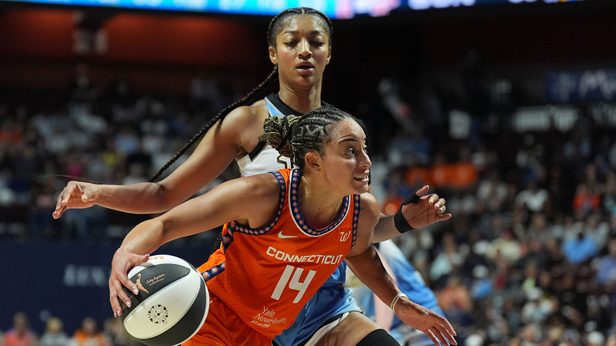 Connecticut Sun guard Bria Hartley (14) drives the ball against Chicago Sky forward Angel Reese (5) in the second half at Mohegan Sun Arena.