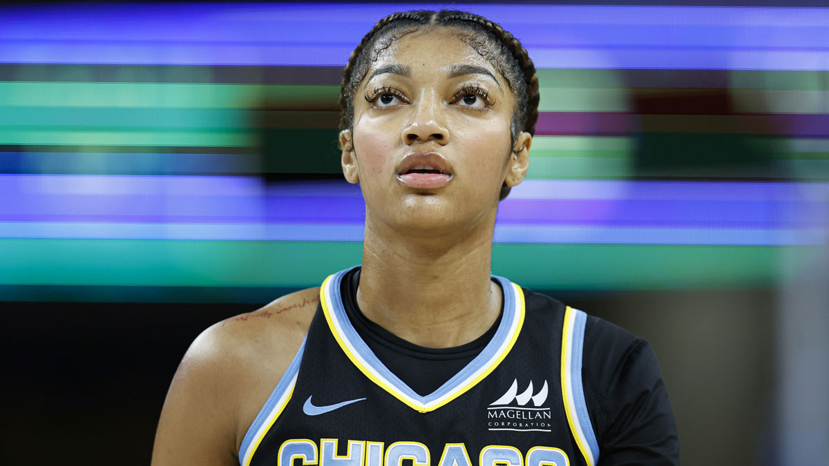 Chicago Sky forward Angel Reese (5) walks on the court during the first half of a WNBA game against the Washington Mystics at Wintrust Arena.