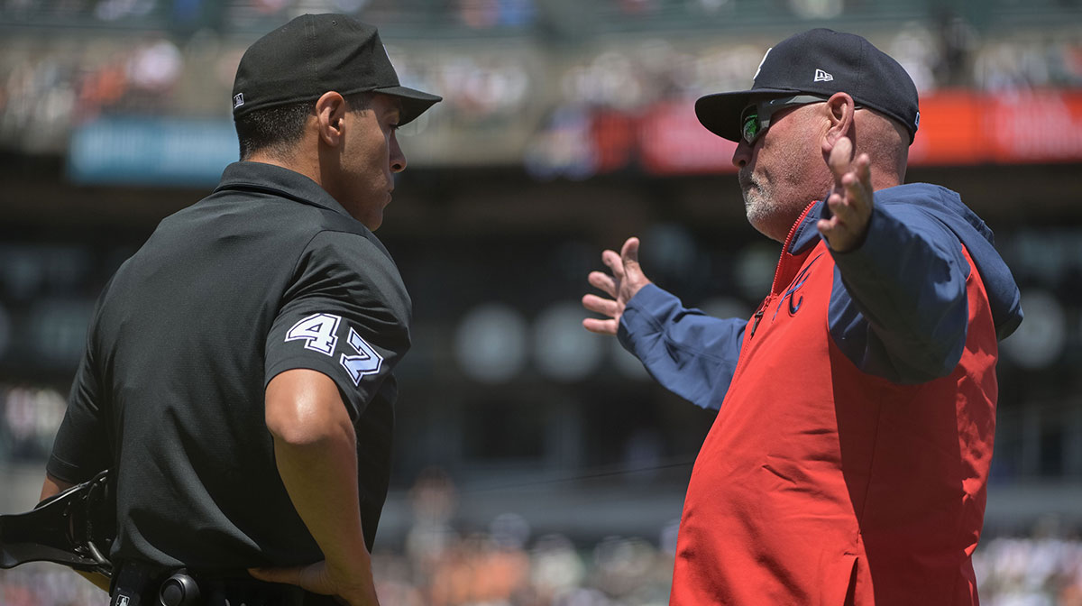 Atlanta Braves manager Brian Snitker argues a call with umpire Gabe Morales (47) during the fifth inning of the game against the San Francisco Giants at Oracle Park.
