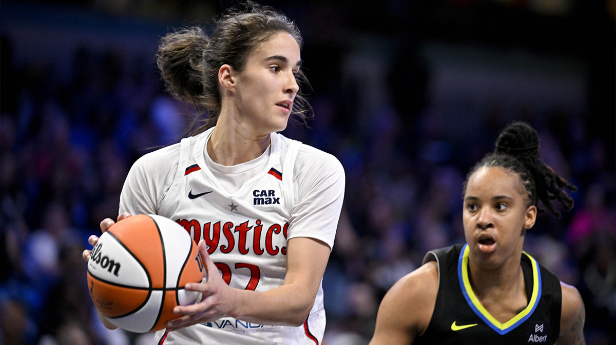 Washington Mystics guard Sonia Citron (22) grabs a rebound against the Dallas Wings during the second half at College Park Center.