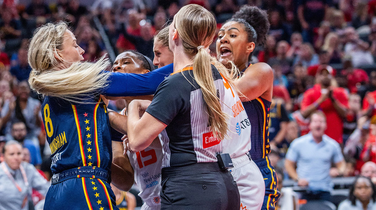 Indiana Fever guard Sophie Cunningham (8) and Connecticut Sun guard Jacy Sheldon (4) get into a fight in the second half at Gainbridge Fieldhouse.