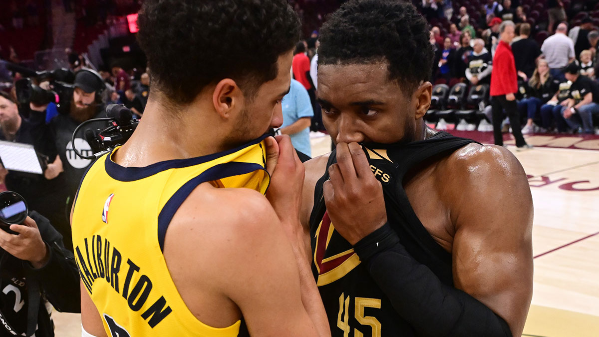 Indiana Pacers guard Tyrese Haliburton (0) talks to Cleveland Cavaliers guard Donovan Mitchell (45) after game five of the second round for the 2025 NBA Playoffs at Rocket Arena.