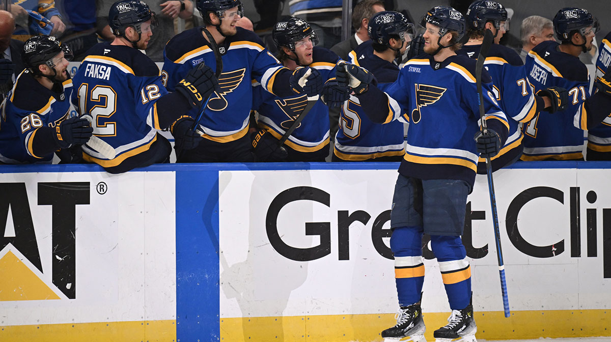 St. Louis Blues defenseman Philip Broberg (6) celebrates with teammates after scoring a goal against the Winnipeg Jets during the first period in game six of the first round of the 2025 Stanley Cup Playoffs at Enterprise Center.