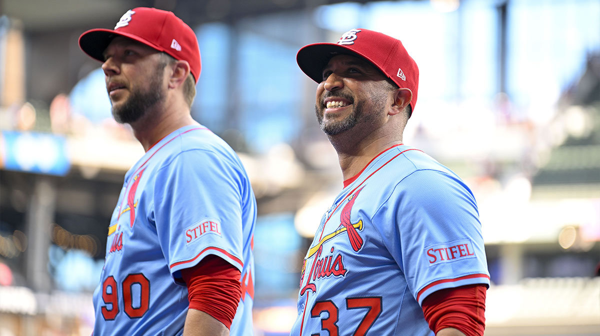 St. Louis Cardinals manager Oliver Marmol (37) and pitching coach Dusty Blake (90) look to the stands after the Cardinals defeat the Texas Rangers at Globe Life Field.