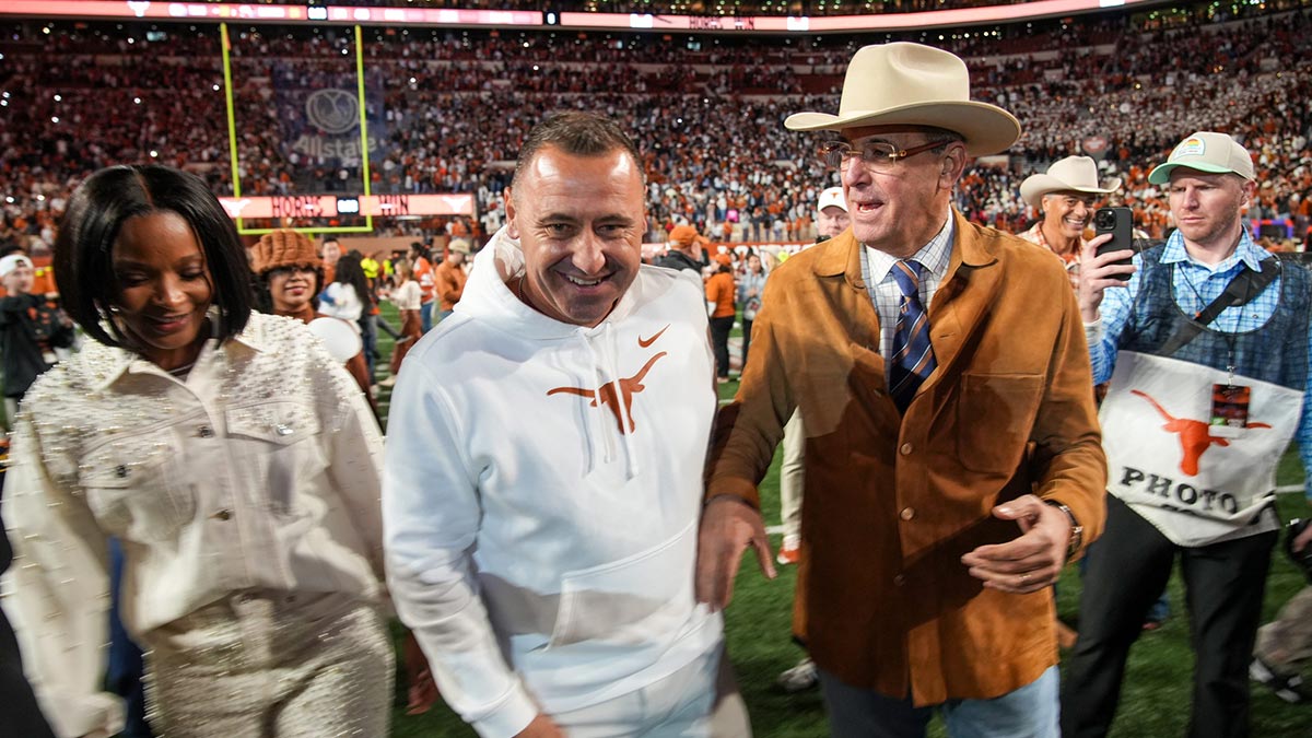 Texas Longhorns head coach Steve Sarkisian and Chris Del Conte celebrate a win over Clemson Tigers 38-24 in the NCAA College Football Playoffs first round game at Darrell K Royal Texas Memorial Stadium, Austin, Texas, Saturday, Dec. 21, 2024.