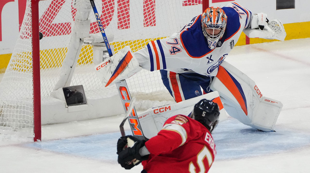 Florida Panthers defenseman Aaron Ekblad (5) scores during the third period against Edmonton Oilers goaltender Stuart Skinner (74) in game three of the 2025 Stanley Cup Final at Amerant Bank Arena.