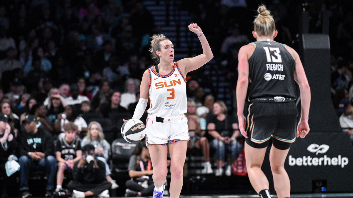 Connecticut Sun guard Marina Mabrey (3) brings the ball up court while being defended by New York Liberty forward Leonie Fiebich (13) during the first half at Barclays Center.