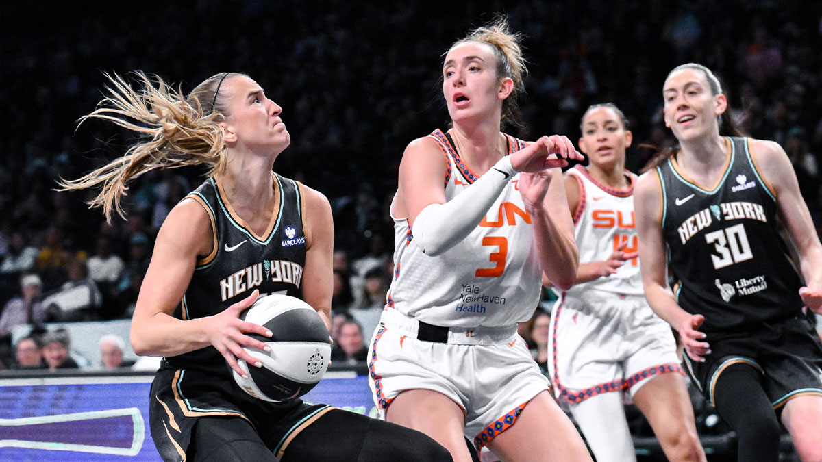 New York Liberty guard Sabrina Ionescu (20) drives to the basket while being defended by Connecticut Sun guard Marina Mabrey (3) during the second half at Barclays Center.