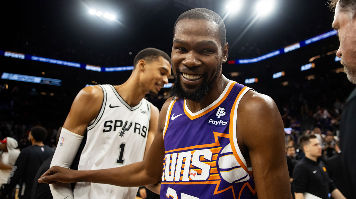 Suns' Kevin Durant and Spurs' Victor Wembanyama smiling