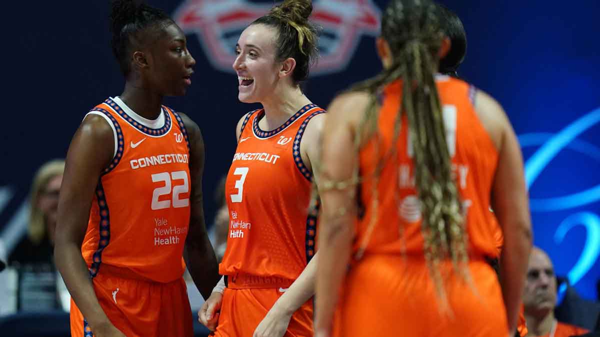 Connecticut Sun guard Marina Mabrey reacts with guard Saniya Rivers after a play against the Atlanta Dream in the second half at Mohegan Sun Arena.