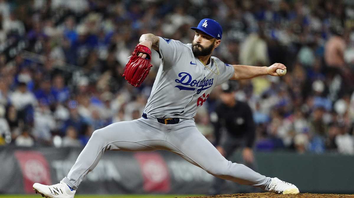 Jun 24, 2025; Denver, Colorado, USA; Los Angeles Dodgers relief pitcher Tanner Scott (66) delivers a pitch in the ninth inning against the Colorado Rockies at Coors Field. 