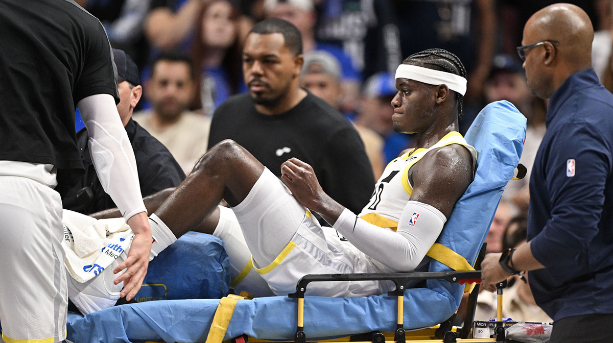 Utah Jazz forward Taylor Hendricks (0) is taken off the court after suffering a leg injury during the second half against the Dallas Mavericks at the American Airlines Center. 