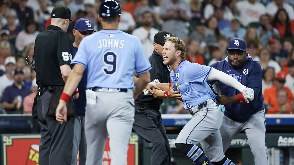 Tampa Bay Rays shortstop Taylor Walls (6) argues a strike with umpire Nic Lentz (59) against the Houston Astros in the ninth inning at Daikin Park.Walls was ejected from the game .