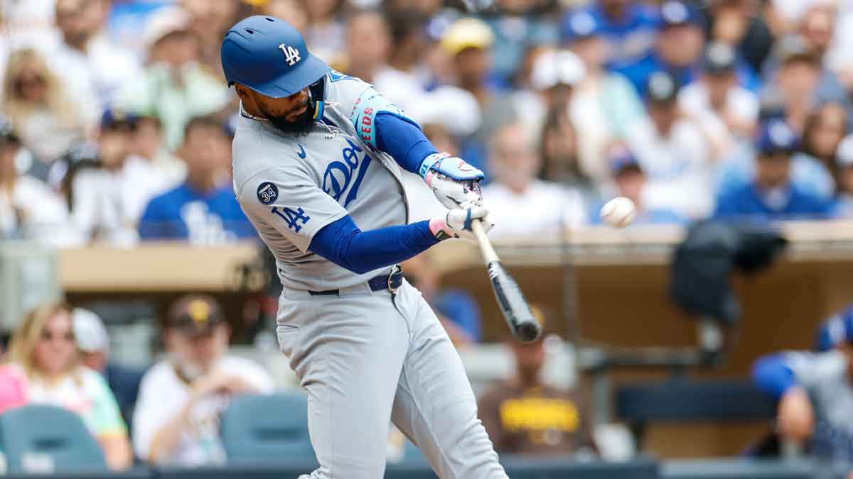 Jun 11, 2025; San Diego, California, USA; Los Angeles Dodgers right fielder Teoscar Hernandez (37) hits a three run home run during the sixth inning against the San Diego Padres at Petco Park.
