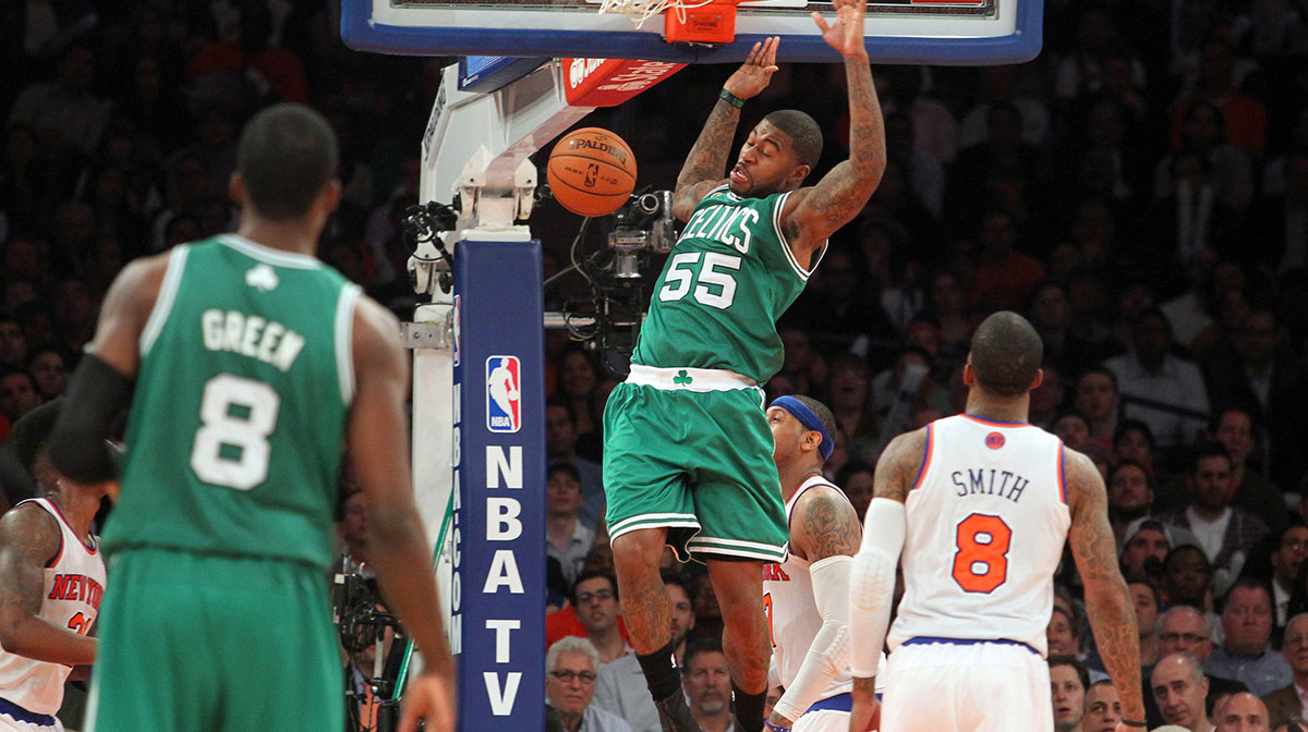 Boston Celtics guard Terrence Williams (55) dunks over New York Knicks forward Carmelo Anthony (7) during the third quarter of game five of the first round of the 2013 NBA Playoffs at Madison Square Garden.