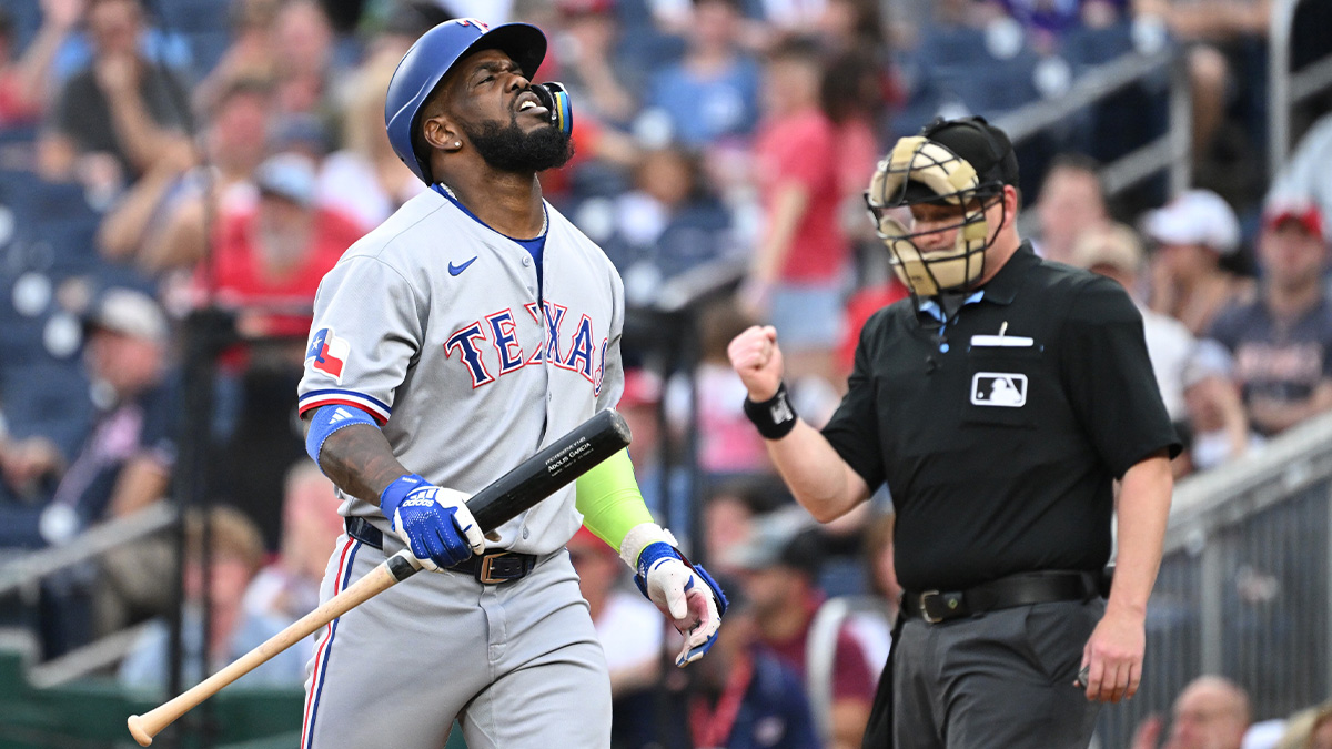 Texas Rangers right fielder Adolis Garcia (53) reacts after striking out during the third inning against the Washington Nationals at Nationals Park. Seager deGrom