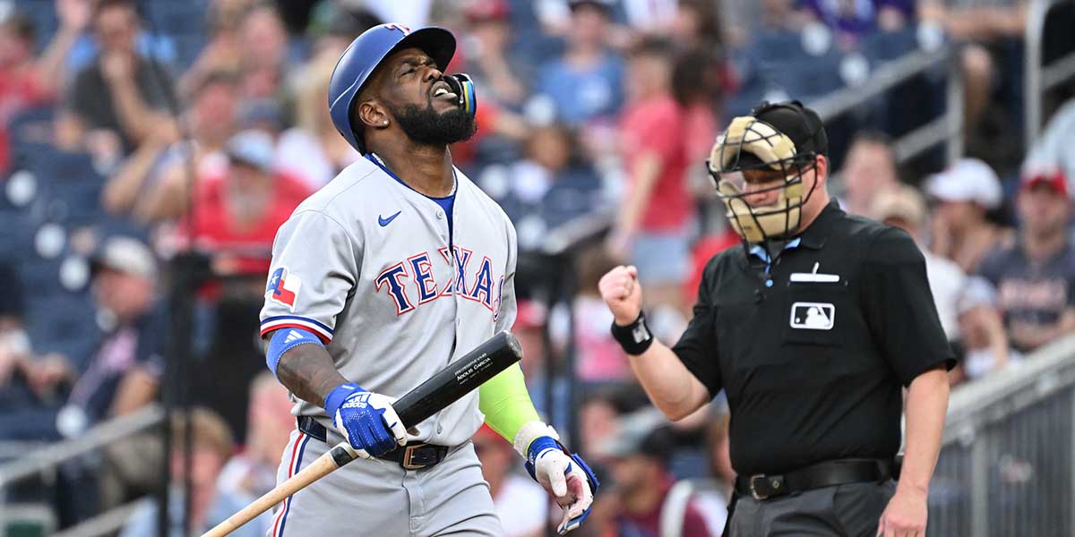 Texas Rangers right fielder Adolis Garcia (53) reacts after striking out during the third inning against the Washington Nationals at Nationals Park.