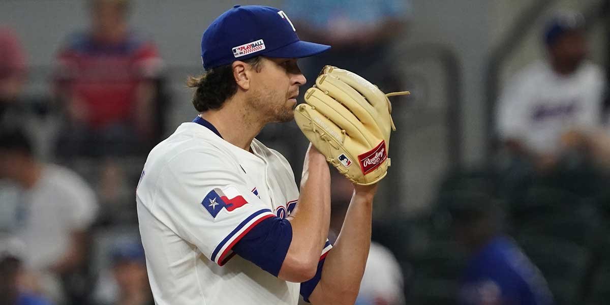 Texas Rangers pitcher Jacob deGrom (48) looks in for the sign during the fourth inning against the Chicago White Sox at Globe Life Field. Cowser