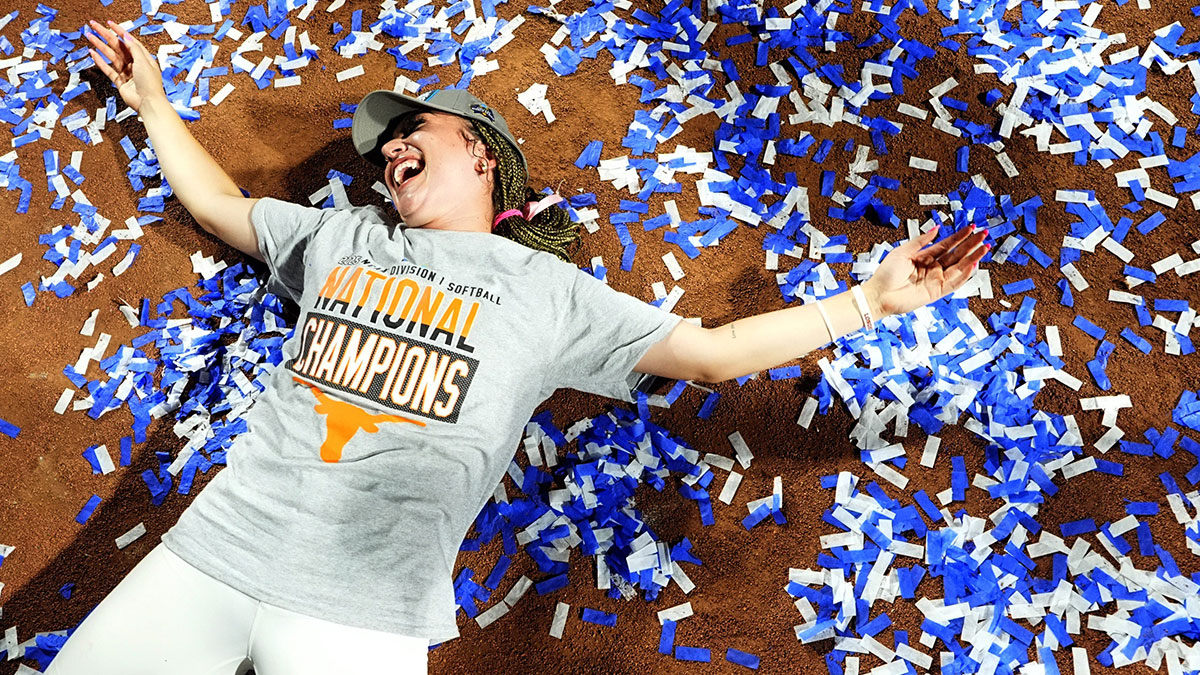 Texas's Vanessa Quiroga (3) celebrate following the Women's College World Series championship game between Texas Tech and Texas.