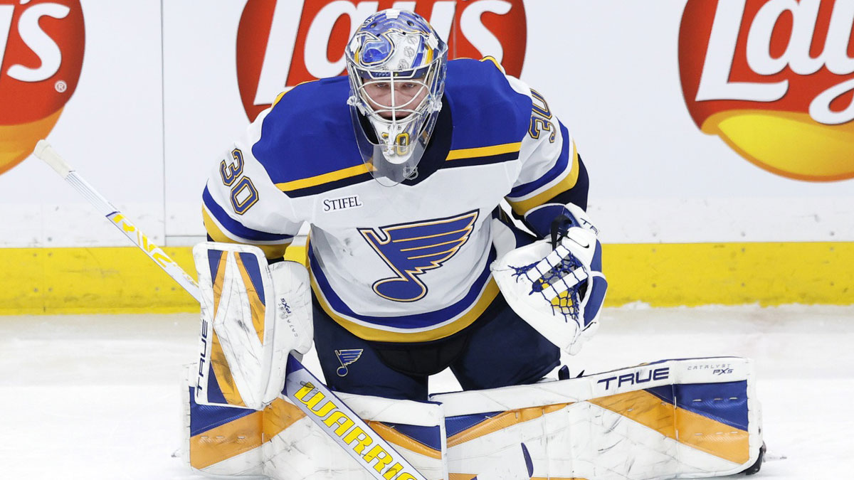 St. Louis Blues goaltender Joel Hofer (30) warms up before a game against the Winnipeg Jets at Canada Life Centre.