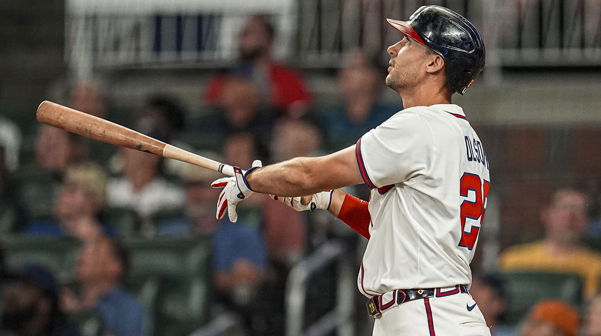 Atlanta Braves first baseman Matt Olson (28) hits a home run against the New York Mets during the seventh inning at Truist Park.