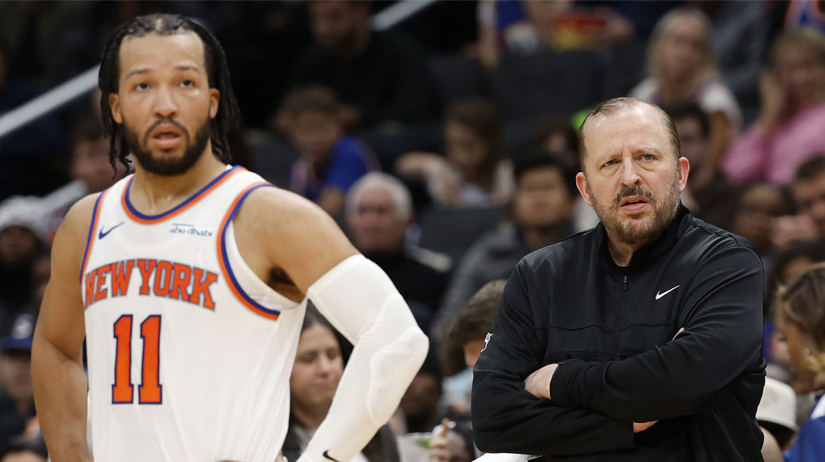 New York Knicks head coach Tom Thibodeau (R) and Knicks guard Jalen Brunson (11) look on during a stoppage in play against the Washington Wizards in the third quarter at Capital One Arena.