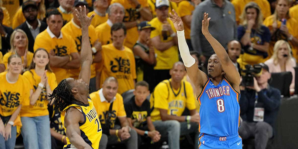 Thunder forward Jalen Williams (8) shoots the ball against Indiana Pacers forward Aaron Nesmith (23) during the first half of game six of the 2025 NBA Finals between the Oklahoma City Thunder and the Indiana Pacers at Gainbridge Fieldhouse
