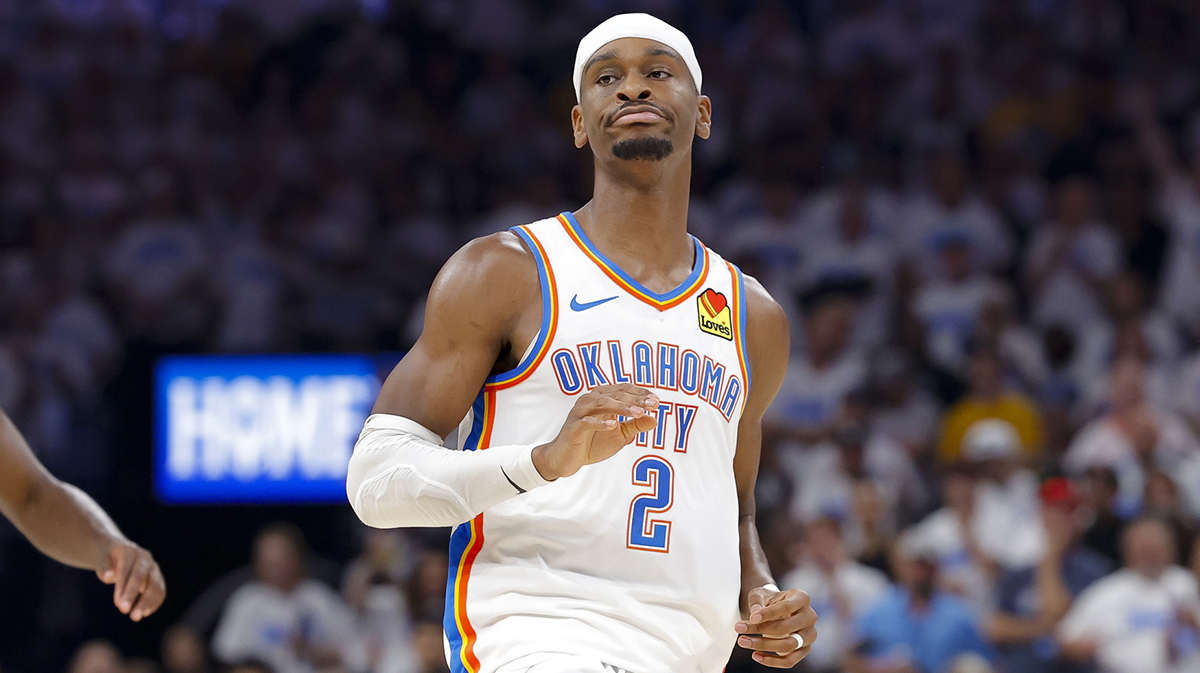 Thunder guard Shai Gilgeous-Alexander (2) reacts to making a basket against the Indiana Pacers during the third quarter during game one of the 2025 NBA Finals at Paycom Center