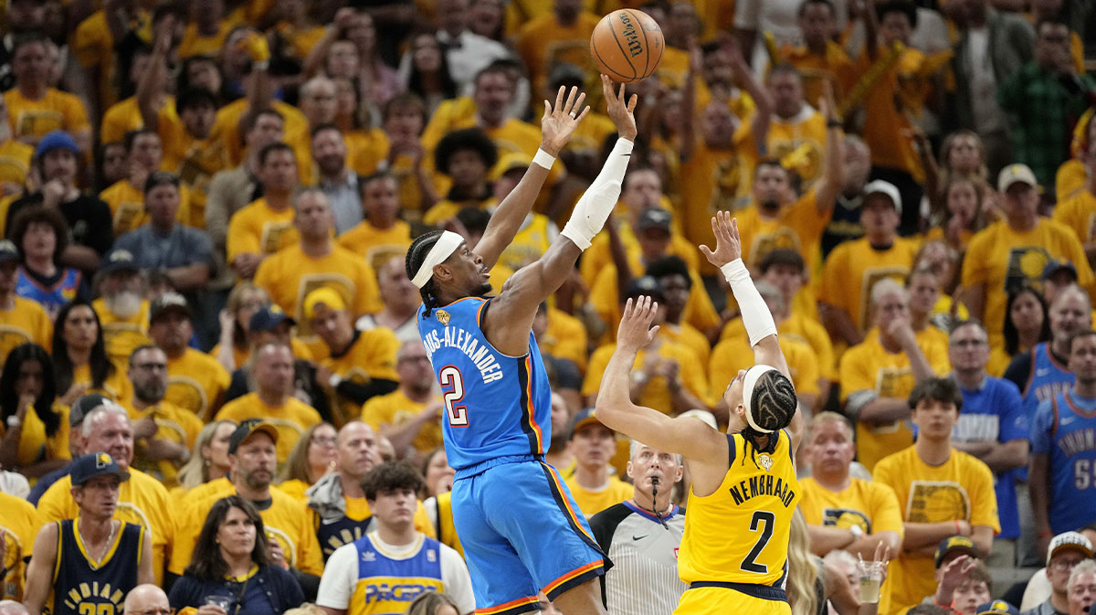 Thunder guard Shai Gilgeous-Alexander (2) shoots the ball against Indiana Pacers guard Andrew Nembhard (2) during the second half during game four of the 2025 NBA Finals at Gainbridge Fieldhouse