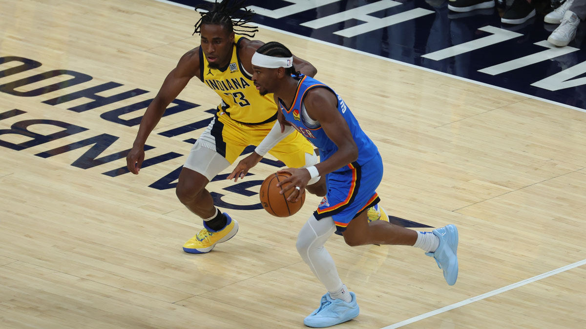 Thunder guard Shai Gilgeous-Alexander (2) drives to the hoop past Indiana Pacers center Myles Turner (33) during the second quarter of game four of the 2025 NBA Finals at Gainbridge Fieldhouse