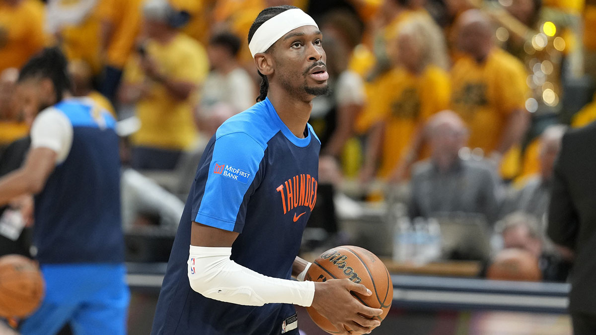 Thunder guard Shai Gilgeous-Alexander (2) warms up before game six of the 2025 NBA Finals between the Oklahoma City Thunder and the Indiana Pacers at Gainbridge Fieldhouse