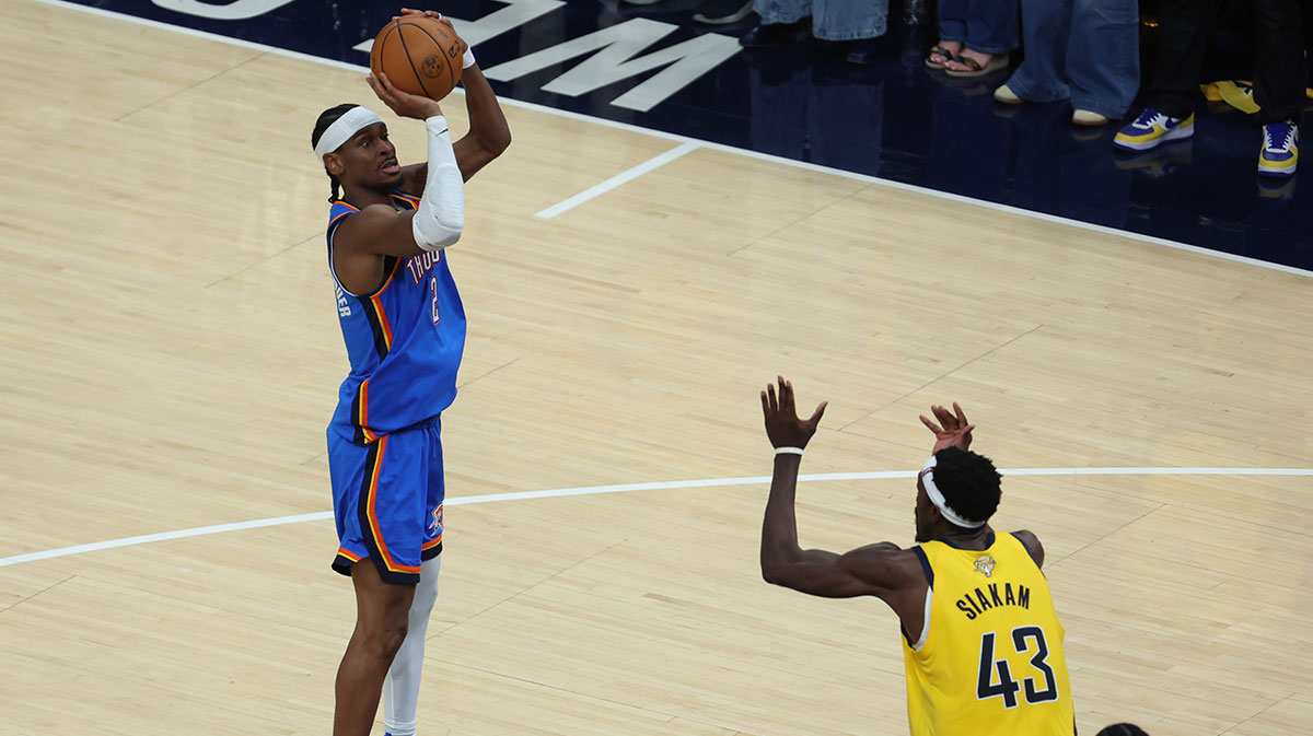 Thunder guard Shai Gilgeous-Alexander (2) shoots a layup past Indiana Pacers forward Pascal Siakam (43) during the fourth quarter of game four of the 2025 NBA Finals at Gainbridge Fieldhouse