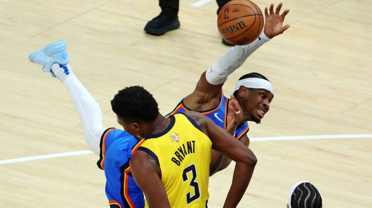 Thunder guard Shai Gilgeous-Alexander (2) drives to the basket against Indiana Pacers center Thomas Bryant (3) during the fourth quarter in game three of the 2025 NBA Finals at Gainbridge Fieldhouse