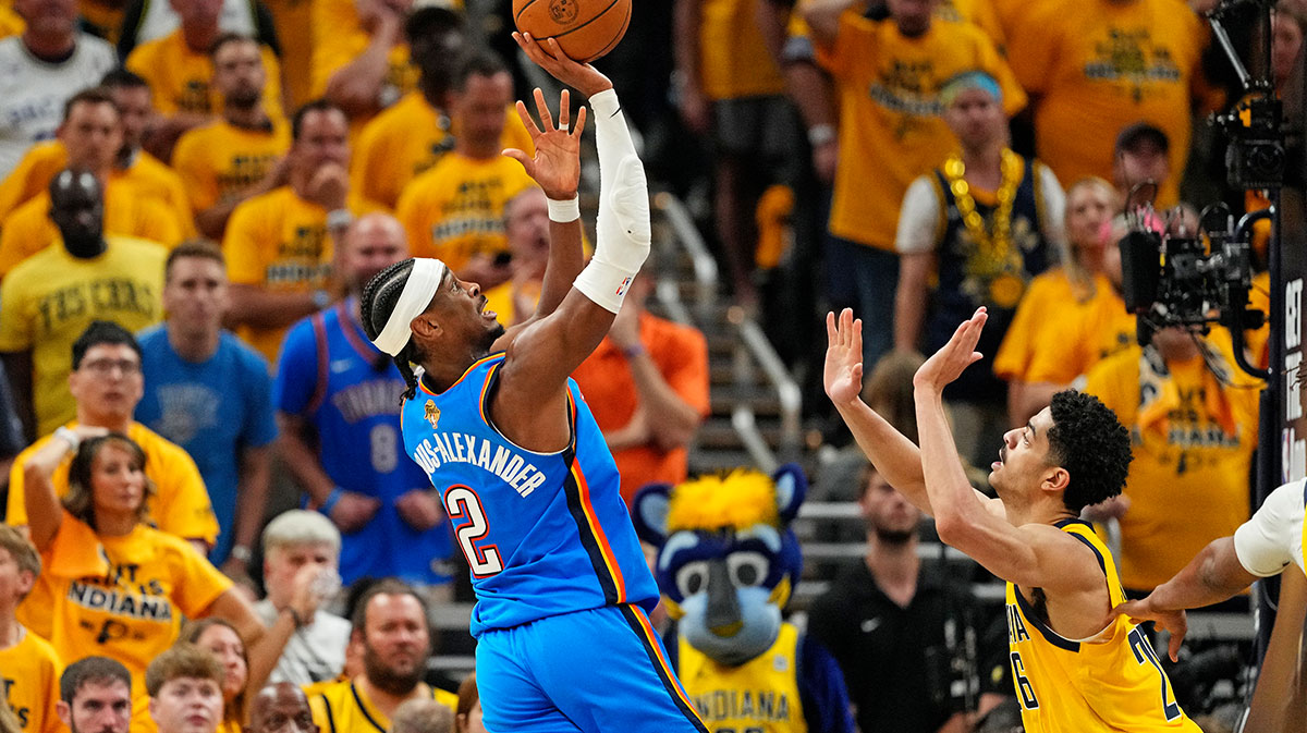 Thunder guard Shai Gilgeous-Alexander (2) shoots the ball against Indiana Pacers guard Ben Sheppard (26) during the third quarter in game three of the 2025 NBA Finals at Gainbridge Fieldhouse