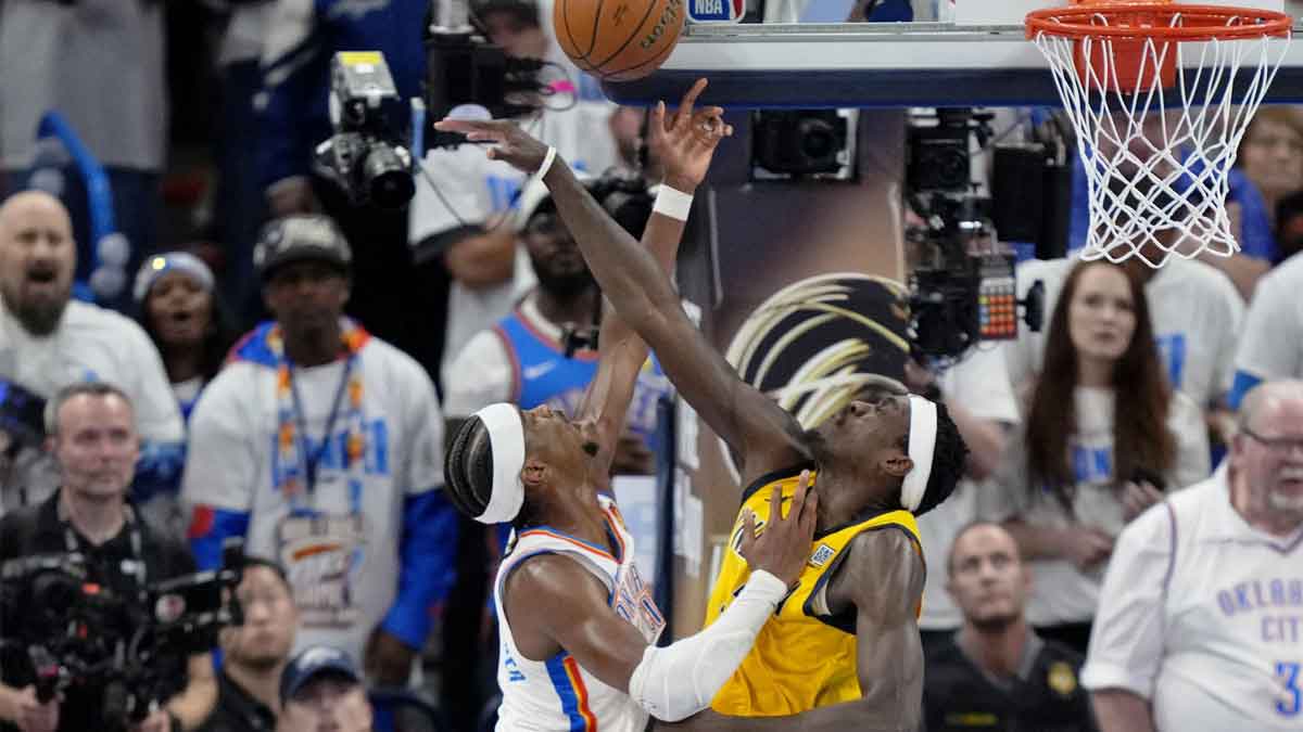 Pacers forward Pascal Siakam (43) blocks the shot of Oklahoma City Thunder guard Shai Gilgeous-Alexander (2) during the fourth quarter in game one of the 2025 NBA Finals at Paycom Center