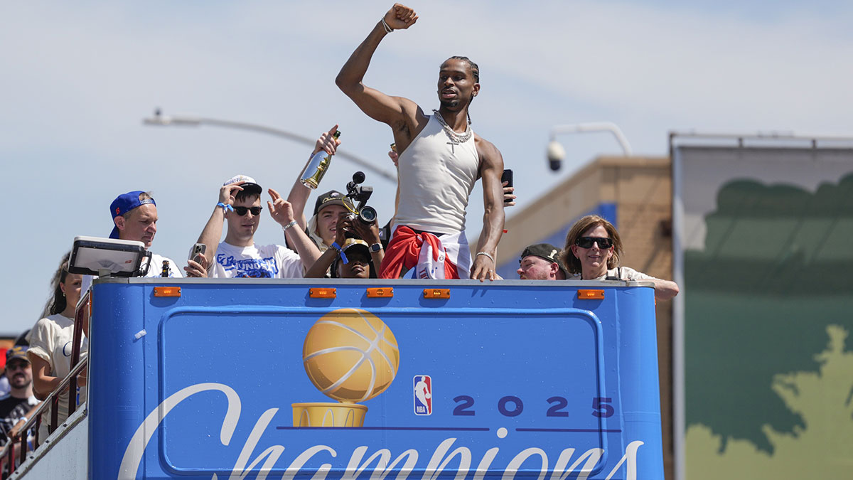Thunder guard Shai Gilgeous-Alexander gestures to the crowd as the Oklahoma City Thunder celebrate their first NBA Finals title win with a champions parade throughout downtown Oklahoma City on Tuesday, June 24, 2025