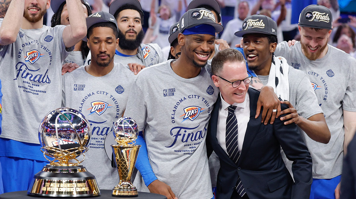 Thunder guard Shai Gilgeous-Alexander hugs Oklahoma City Thunder executive vice president and general manager Sam Presti after their team defeated the Minnesota Timberwolves in game five of the western conference finals for the 2025 NBA Playoffs at Paycom Center