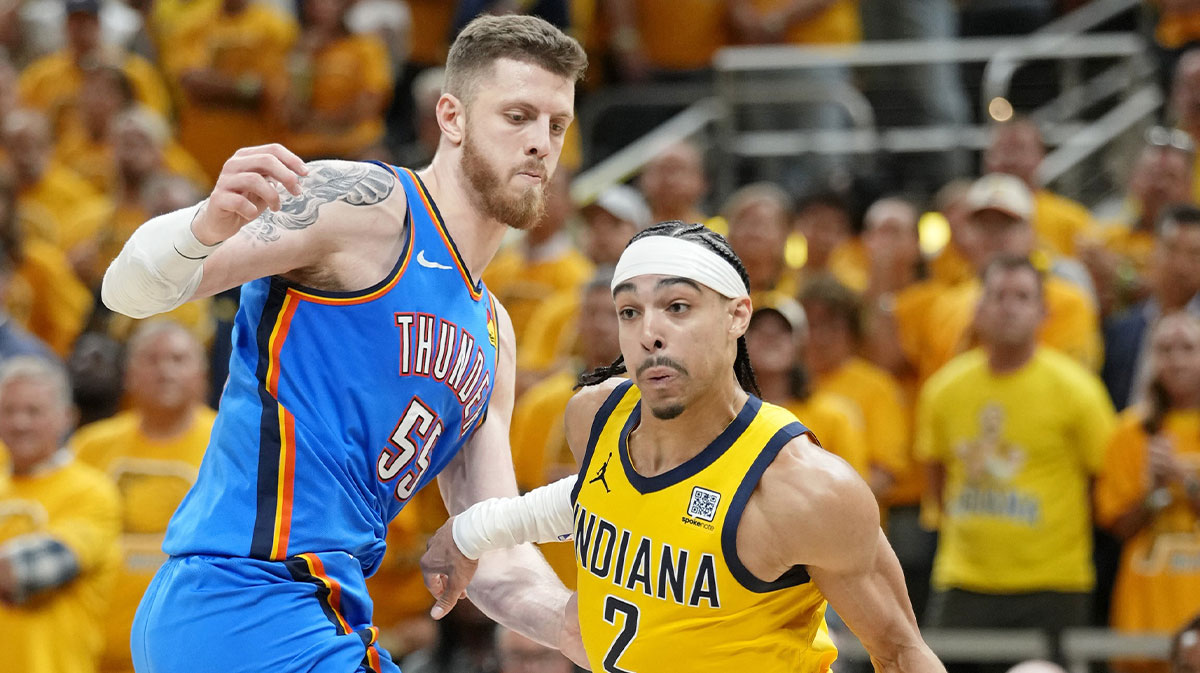 Indiana Pacers guard Andrew Nembhard (2) drives to the basket against Oklahoma City Thunder center Isaiah Hartenstein (55) during the second half during game four of the 2025 NBA Finals at Gainbridge Fieldhouse. Mark Daigneault