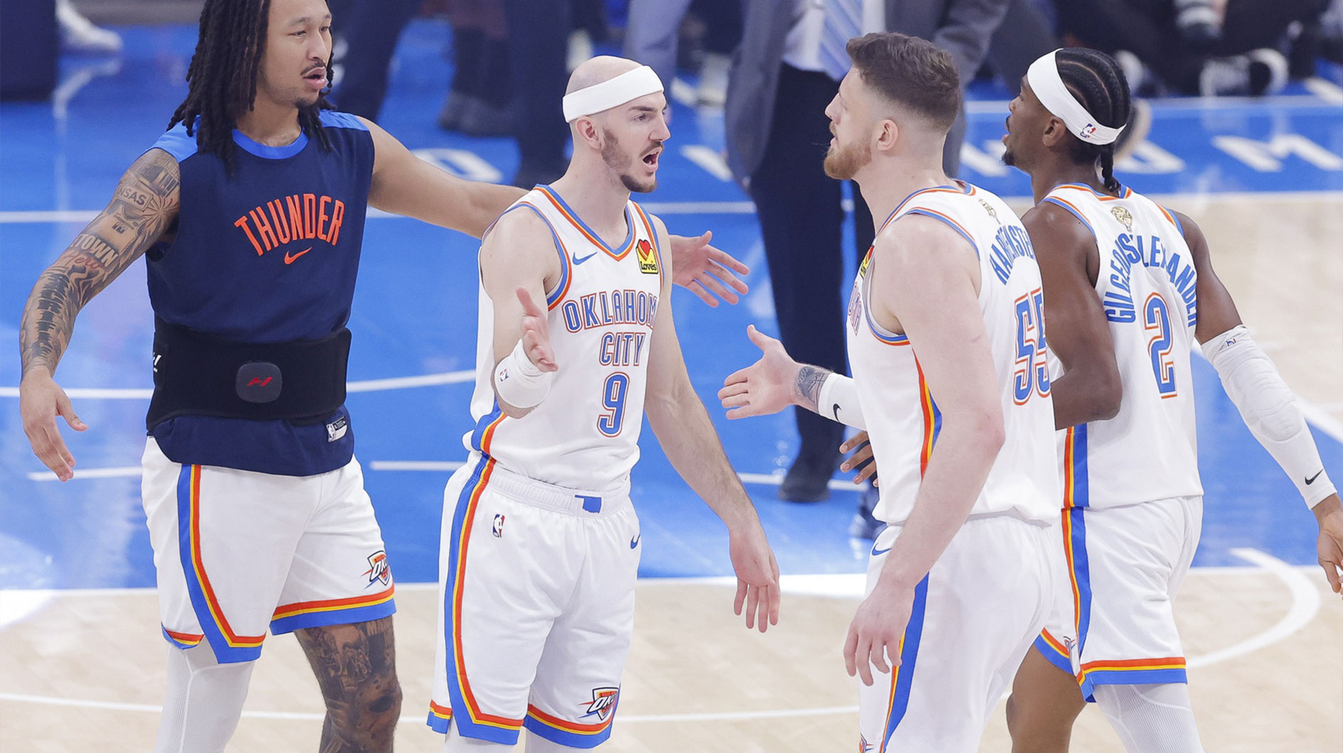 Thunder guard Alex Caruso (9) and center Isaiah Hartenstein (55) and guard Shai Gilgeous-Alexander (2) celebrate in the first quarter against the Indiana Pacers during game five of the 2025 NBA Finals at Paycom Center