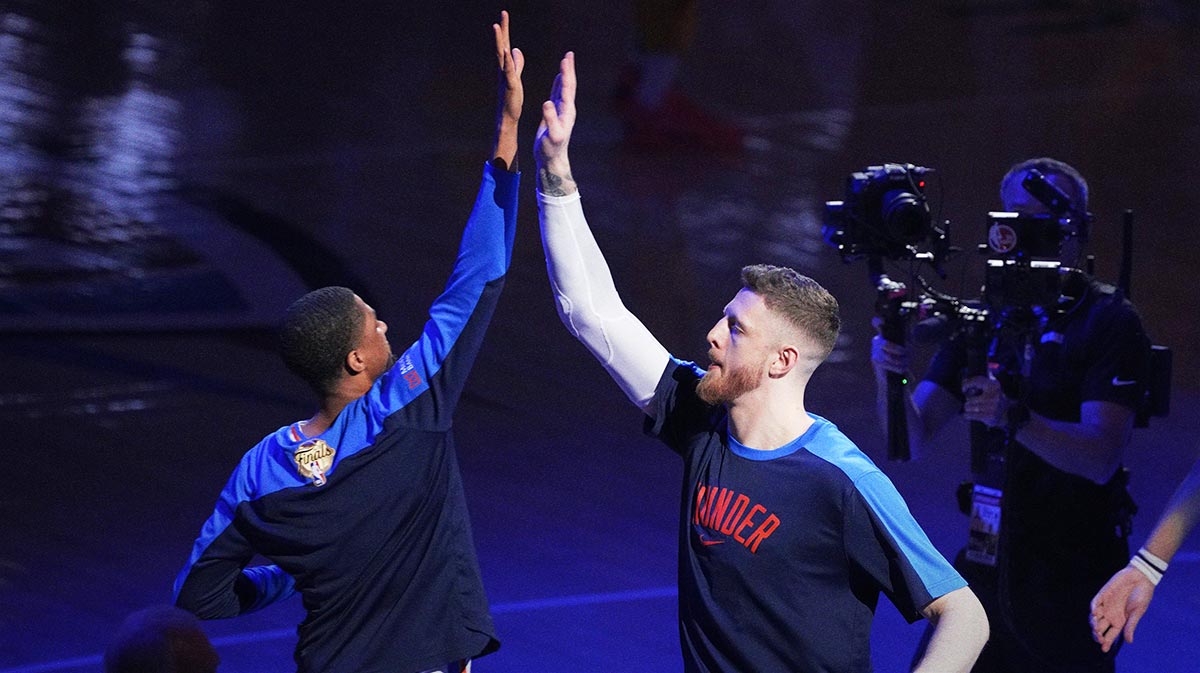 Thunder center Isaiah Hartenstein (right) is introduced prior to game five of the 2025 NBA Finals against the Indiana Pacers at Paycom Center
