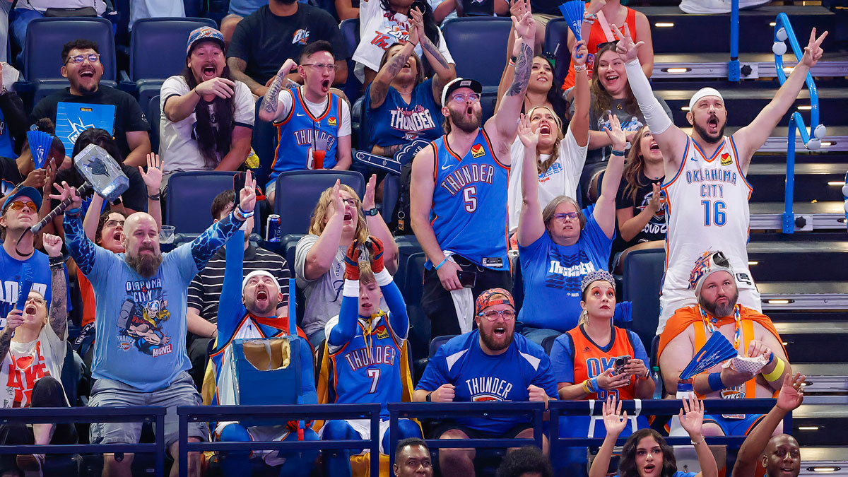 Oklahoma City Thunder fans cheer as they watch game six of the 2025 NBA Finals on the scoreboard video screens during Loud City Live Oklahoma City Thunder Watch Party at Paycom Center.