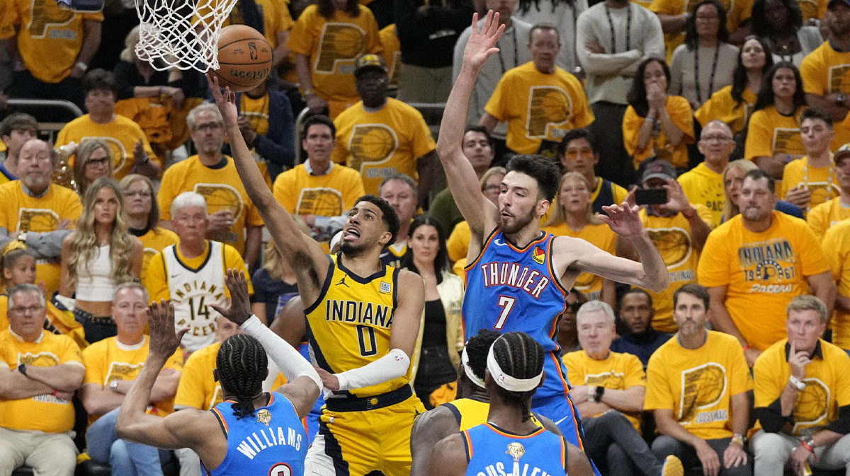 Thunder forward Jalen Williams (8), guard Shai Gilgeous-Alexander (2) and forward Chet Holmgren (7) during the third quarter of game four of the 2025 NBA Finals at Gainbridge Fieldhouse