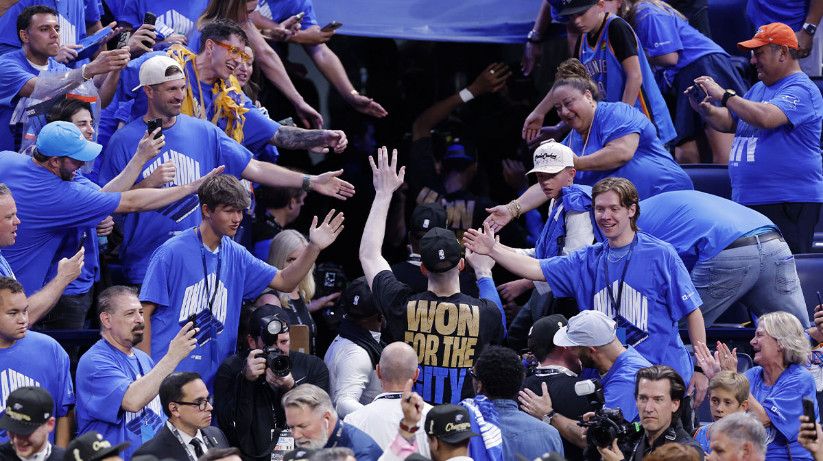 Oklahoma City Thunder forward Chet Holmgren (7) greets fans as he walks off tthe court after winning game seven of the 2025 NBA Finals against the Indiana Pacers at Paycom Center.