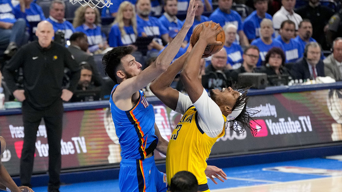 Thunder forward Chet Holmgren (7) blocks a shot by Indiana Pacers center Myles Turner (33) during the third quarter of game two of the 2025 NBA Finals at Paycom Center