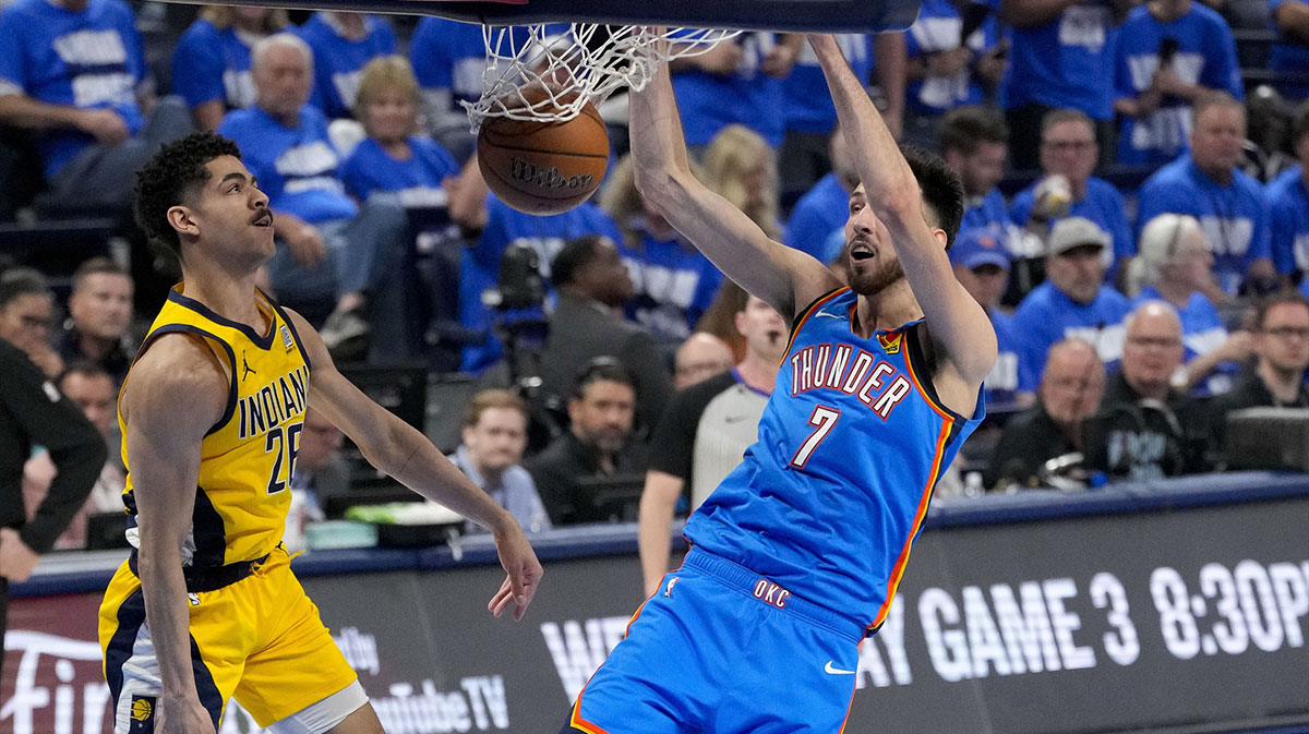 Thunder forward Chet Holmgren (7) dunks the ball past Indiana Pacers guard Ben Sheppard (26) during the second quarter of game two of the 2025 NBA Finals at Paycom Center