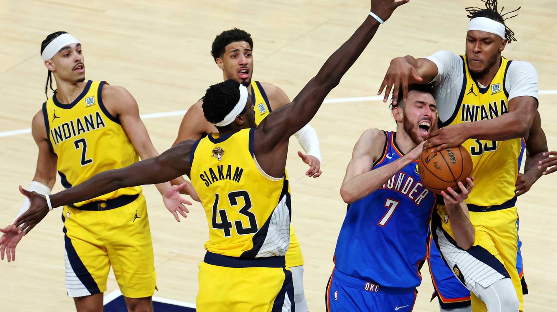Thunder forward Chet Holmgren (7) drives to the basket against Indiana Pacers center Myles Turner (33) during the fourth quarter in game three of the 2025 NBA Finals at Gainbridge Fieldhouse